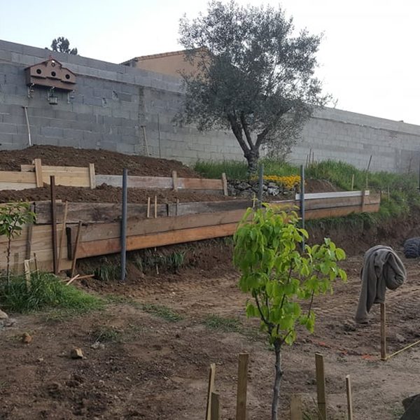 Construction murets pierre terrain de boules